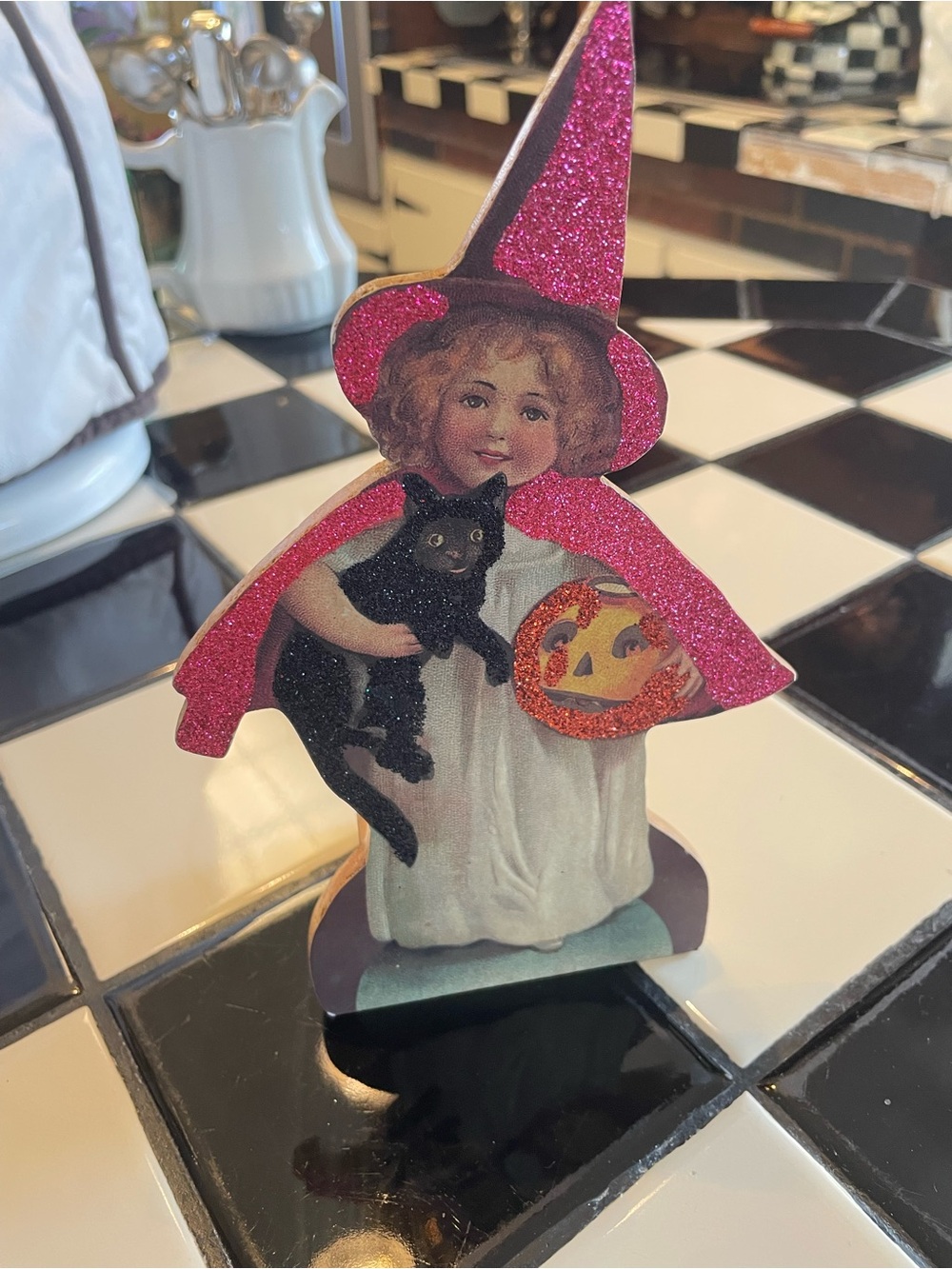 Little girl witch glitter music box .